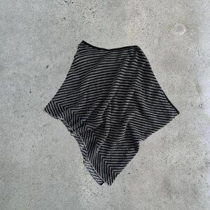 Black and white striped poncho